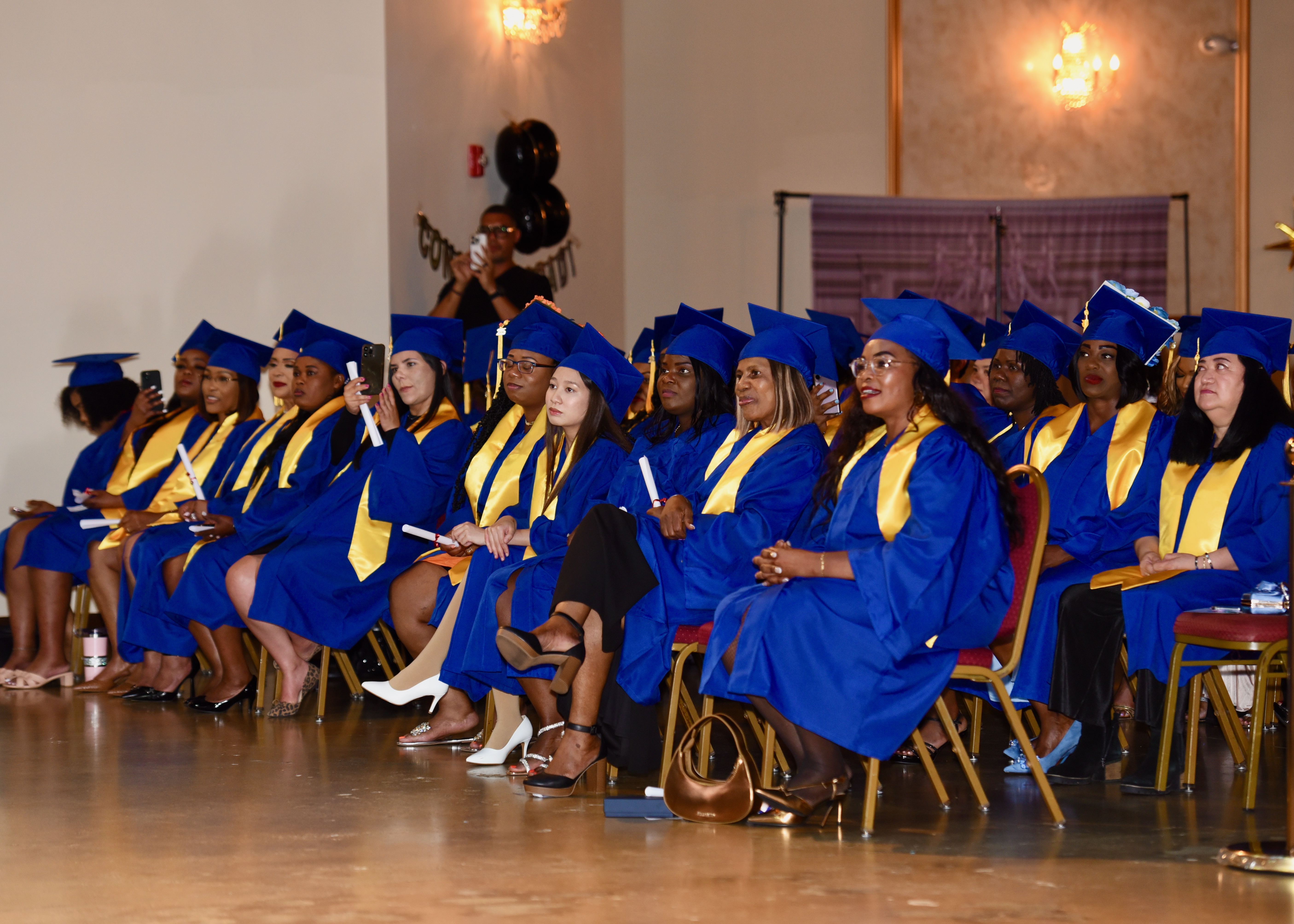 Graduates sitting together